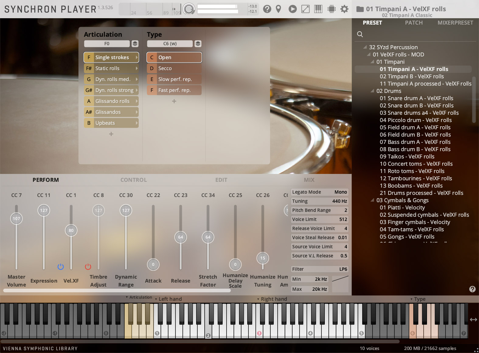 Screenshot of the Synchron Player software interface, displaying articulation and type controls, performance sliders, mix settings, and a virtual keyboard with Timpani A - VelXF rolls preset selected.