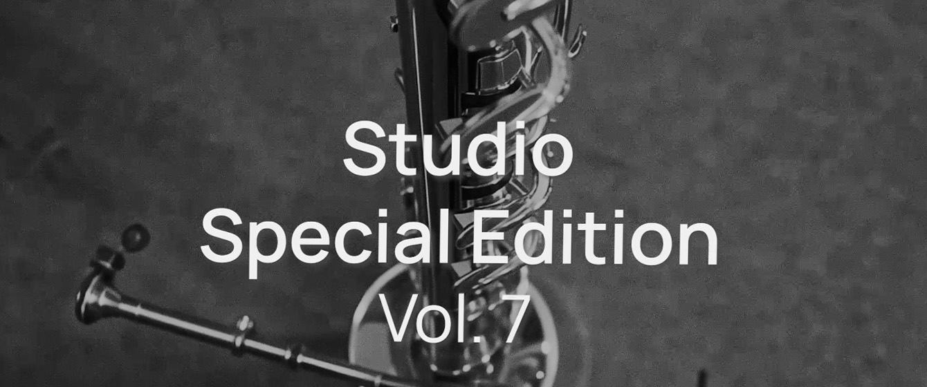 Black and white image with Studio Special Edition Vol.7 text over a blurry background of musical instrument parts and metal tubing.