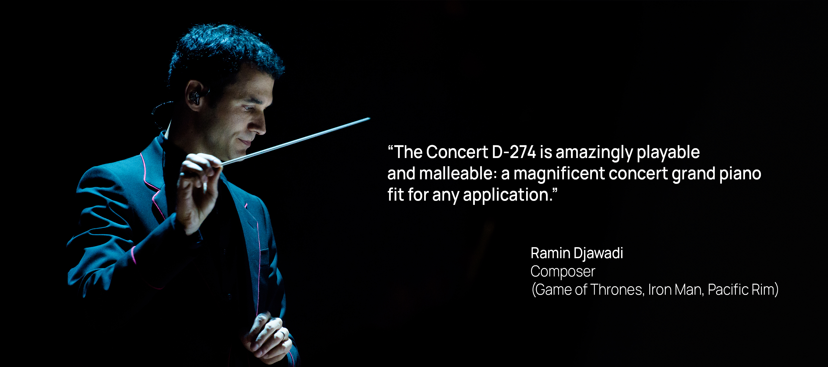 Ramin Djawadi, composer of Game of Thrones and Iron Man, conducting with a baton, praising the Concert D-274 Steinberg grand piano.
