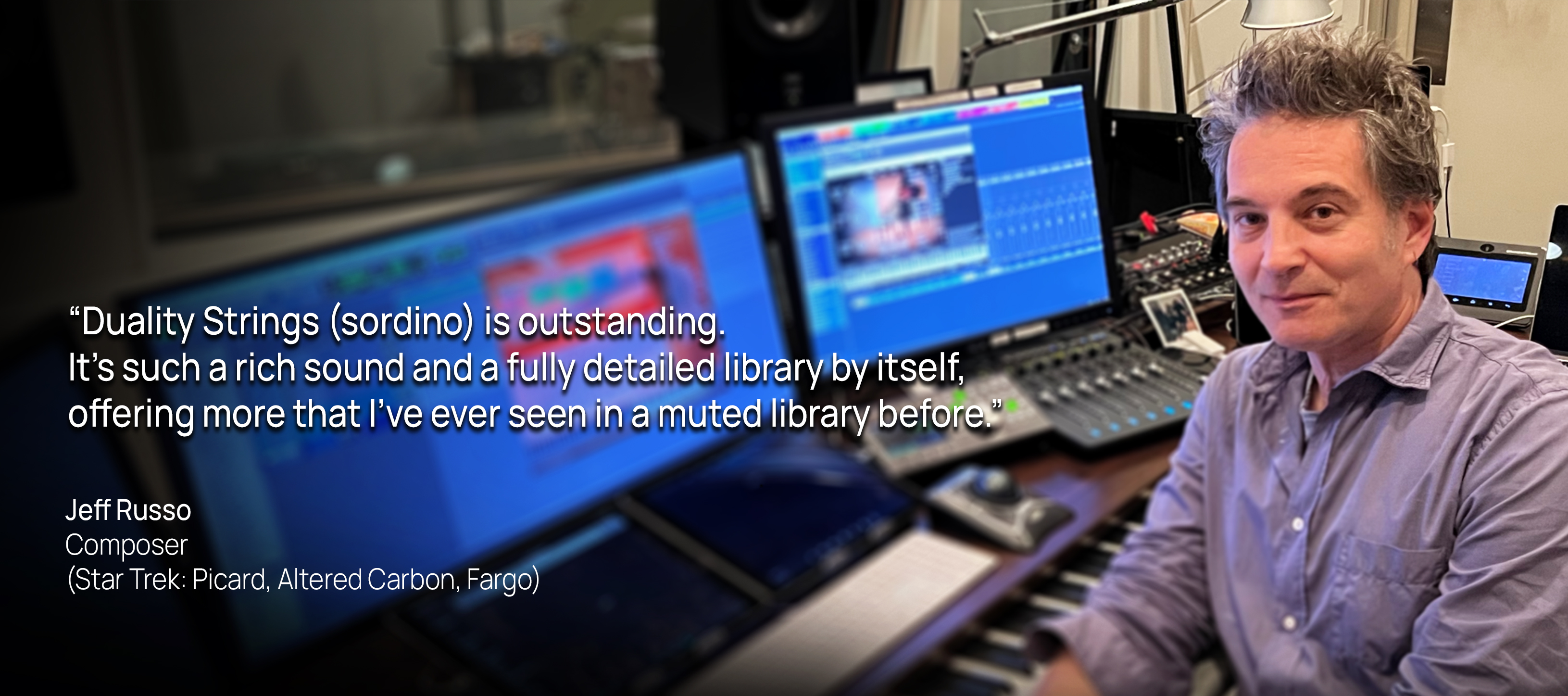 Jeff Russo, composer for Star Trek, Altered Carbon, and Fargo, seated at a music production control board with multiple computer monitors displaying audio software interfaces.